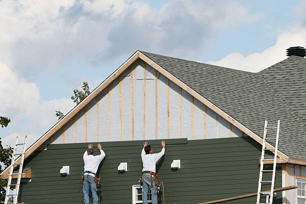 Professional Siding Replacement technician working in Bradenville, PA